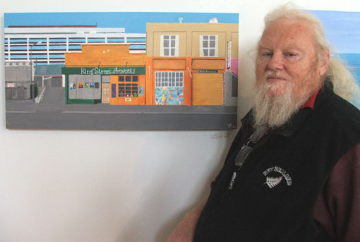 Brent Bartram with one of his paintings