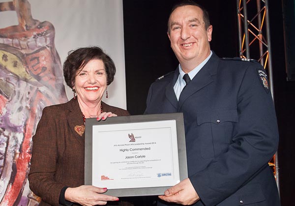 Hon Anne Tolley and Jason Carlyle, receiving the Highly Commended citation in the Arts Access Prison Arts Leadership Award 2014