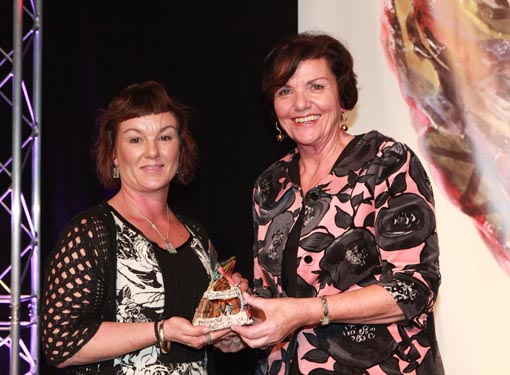  The Hon Ann Tolley, Minister of Corrections, presents the Big 'A' Prison Arts Leadership Award 2013 to Ann Byford 