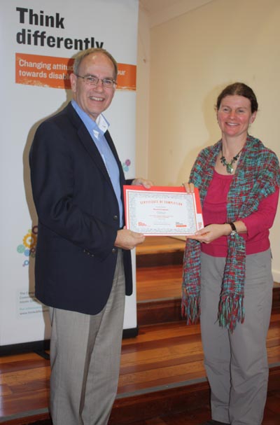 Auckland Mayor Len Brown presents a certificate to participant Rachel Coppage  Photo: Debra Bathgate