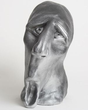 A Munch-esque self-portrait in clay, made during art therapy