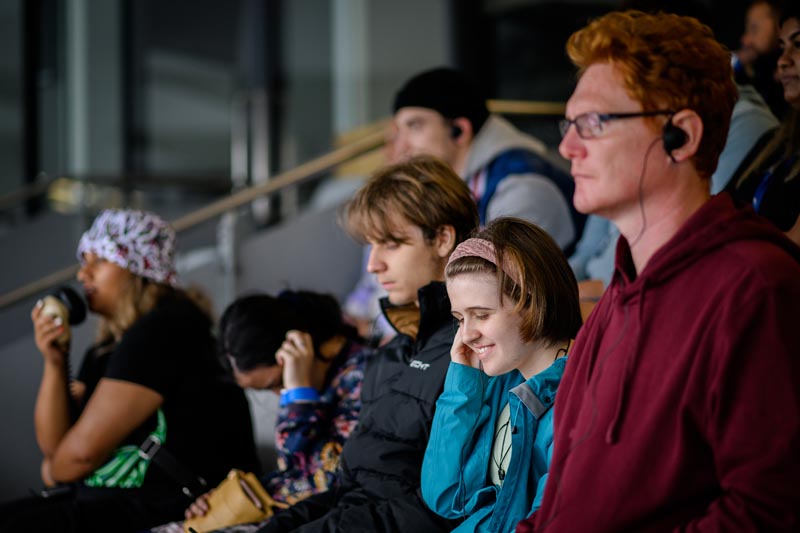 Audience member at Te Matatini smiling