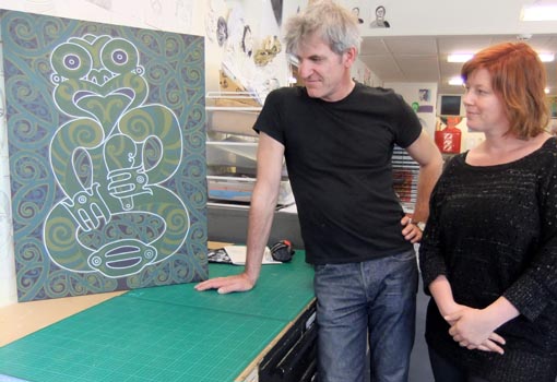 Chris Barrand and Jacqui Moyes admire an artwork