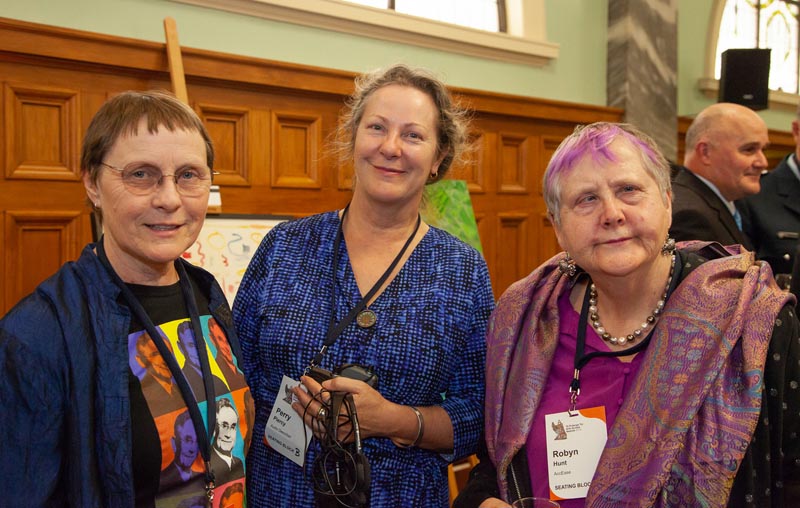 Judith Jones smiles for a photo alongside Perry Piercy and Robyn Hunt at Te Putanga Toi Arts Access Awards 2019.
