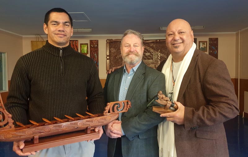 Lawrence Ereatara, Richard Benge and Hone Fletcher with carved taonga created by tāne at Hawke's Bay Regional Prison for Te Putanga Toi Arts Access Awards.
