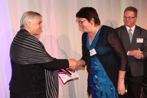  Hon Tariana Turia presents Lorraine Pemberton of Sandz Studio a Highly Commended certificate in the Big 'A' Creative Space Award 2012