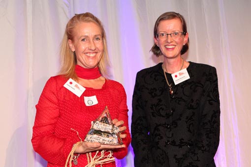 Christine Stevenson, Deputy Chief Executive, Department of Corrections, presents the Big 'A' Prison Arts Leadership Award 2012 to Corina Hazlett