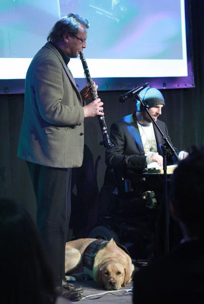Andrew McMillan performs with saxophonist Jeff Henderson at the Big 'A' Awards ceremony
