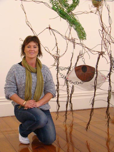 Ann Byford with a sculpture by prisoners submitted to the National Fieldays No. 8 Wire Art Awards  