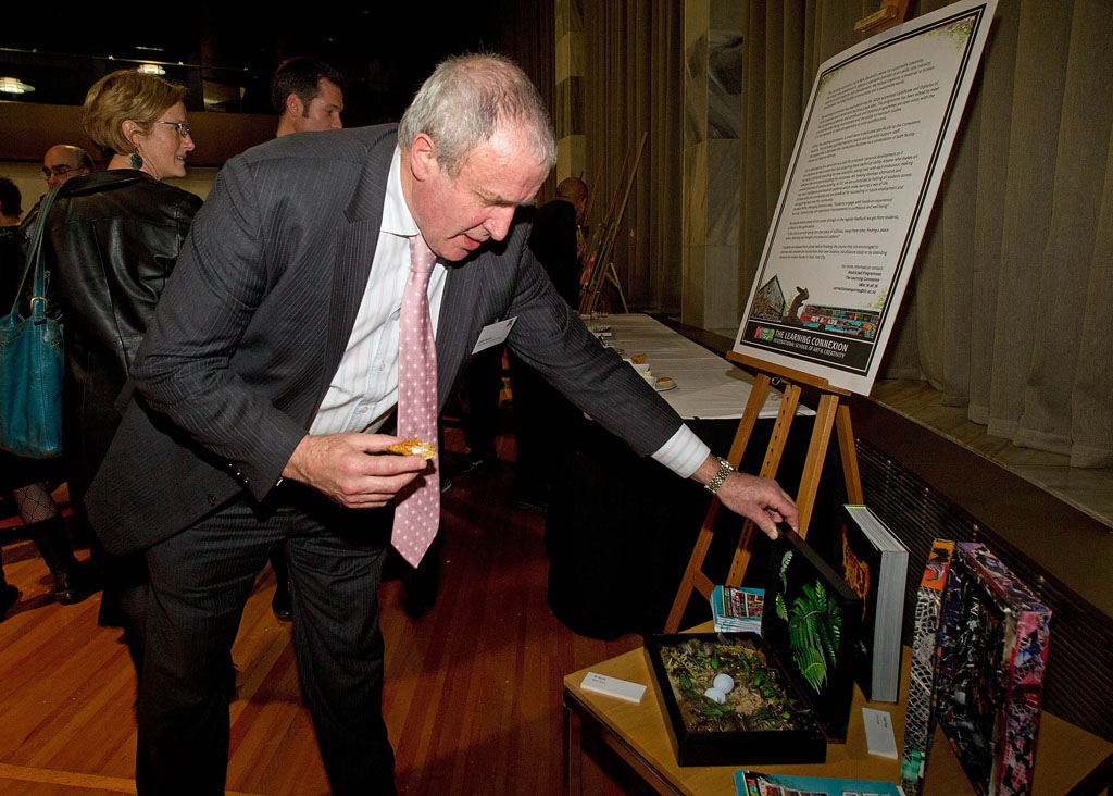 Colin Ryder, Department of Corrections, views the prison artwork on display 