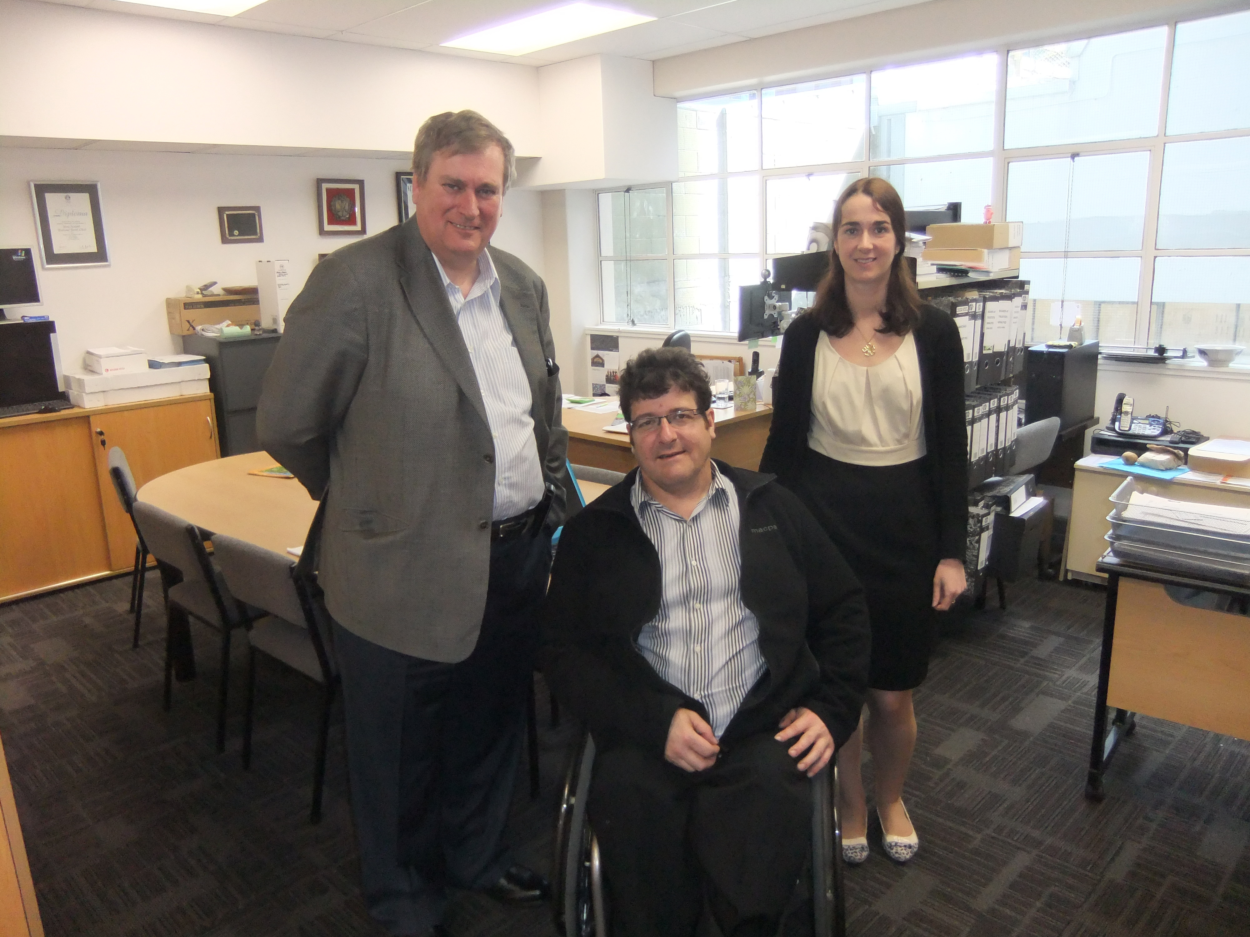 Stew Sexton, centre, with Roger Lloyd and Emma Dowdle of Choirs Aotearoa New Zealand, one of the organisations visited