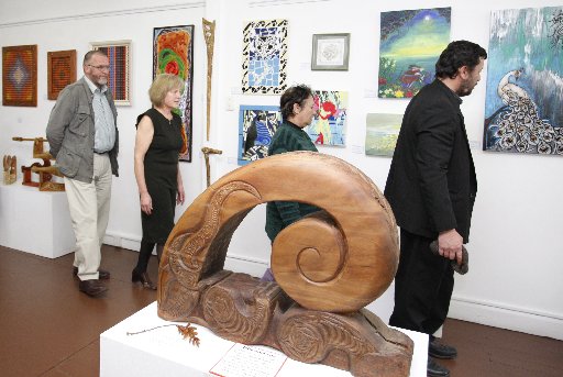 Fred Tito leads the powhiri and blessing of the exhibition